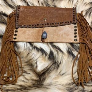 Leather fringe clutch